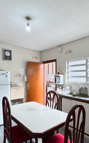 Casa à venda com 112m², 2 quartos e 2 vagas Casa à venda com 112m², 2 quartos e 2 vagasCozinha