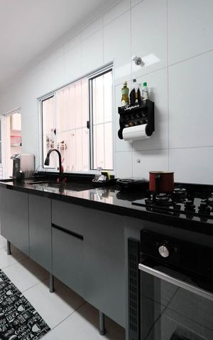 Casa de condomínio à venda com 117m², 3 quartos e 2 vagasCozinha e Área de Serviço