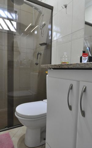 Casa à venda com 145m², 3 quartos e 3 vagasBanheiro da Suíte 1