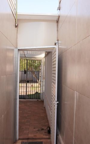 Casa de condomínio para alugar com 65m², 3 quartos e 3 vagasCorredor Quintal - Garagem