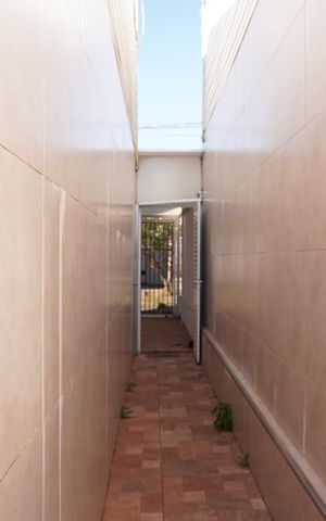 Casa de condomínio para alugar com 65m², 3 quartos e 3 vagasCorredor Quintal - Garagem