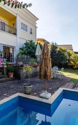 Casa de condomínio para alugar com 375m², 5 quartos e 4 vagas Casa de condomínio para alugar com 375m², 5 quartos e 4 vagasÁrea externa