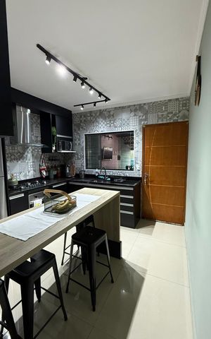 Casa à venda com 90m², 2 quartos e 2 vagas Casa à venda com 90m², 2 quartos e 2 vagasCozinha