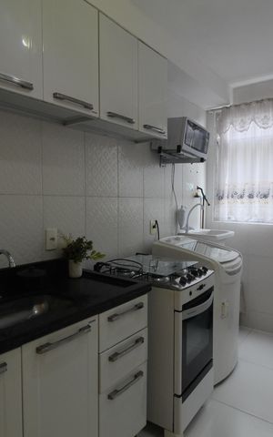 Apartamento à venda com 50m², 2 quartos e 1 vagaCozinha e Área de Serviço
