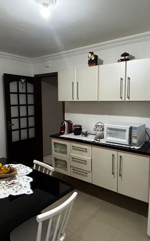 Casa à venda com 100m², 2 quartos e 1 vaga Casa à venda com 100m², 2 quartos e 1 vagaCozinha