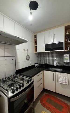 Casa à venda com 100m², 2 quartos e 1 vaga Casa à venda com 100m², 2 quartos e 1 vagaCozinha