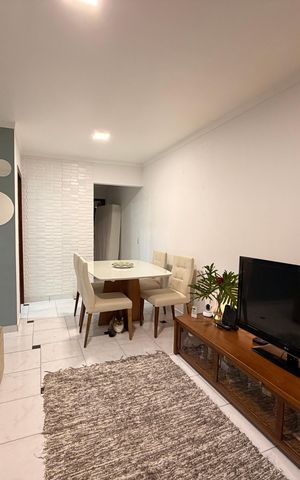 Casa à venda com 90m², 2 quartos e 2 vagasSala