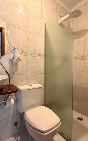 Casa à venda com 90m², 2 quartos e 2 vagasBanheiro da Suíte