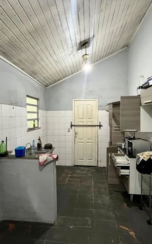 Casa à venda com 9900m², 6 quartos e 5 vagas Casa à venda com 9900m², 6 quartos e 5 vagasCozinha