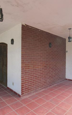 Casa de condomínio para alugar com 376m², 4 quartos e 5 vagasVaranda da sala