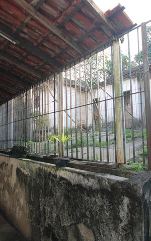 Casa de condomínio para alugar com 376m², 4 quartos e 5 vagasFundos da casa - Edícula