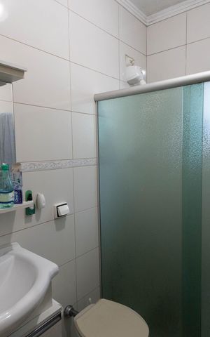 Casa à venda com 198m², 3 quartos e 2 vagas Casa à venda com 198m², 3 quartos e 2 vagasBanheiro 1