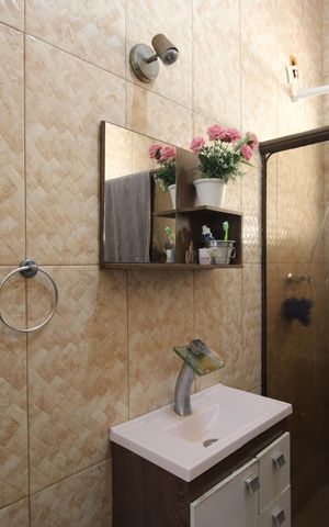 Casa à venda com 210m², 3 quartos e 6 vagasBanheiro social