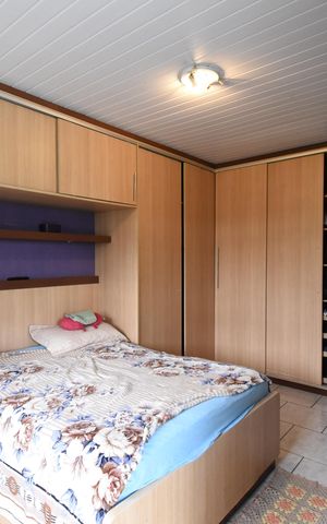 Casa à venda com 155m², 3 quartos e 2 vagasSuíte