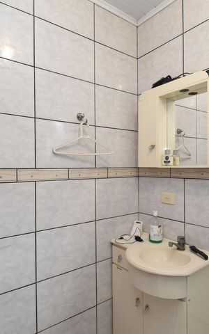 Casa à venda com 155m², 3 quartos e 2 vagasBanheiro da Suíte