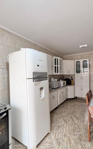 Casa à venda com 107m², 3 quartos e 1 vaga Casa à venda com 107m², 3 quartos e 1 vagaCozinha