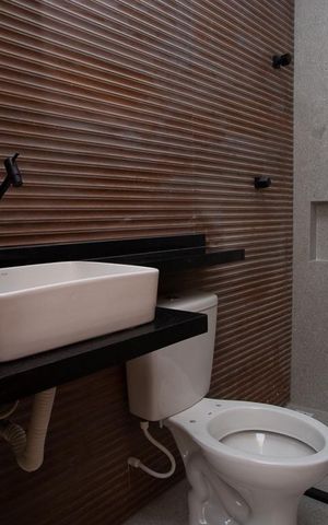 Casa à venda com 160m², 3 quartos e 2 vagasBanheiro da Suíte 3