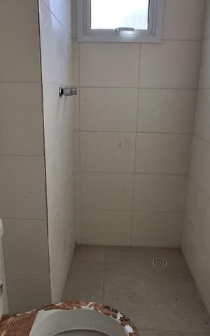 Apartamento à venda com 48m², 2 quartos e 1 vaga Apartamento à venda com 48m², 2 quartos e 1 vagaBanheiro Social