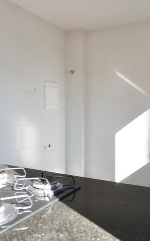 Apartamento à venda com 58m², 2 quartos e 1 vagaCozinha e Área de Serviço