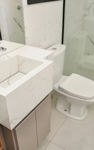Apartamento à venda com 58m², 2 quartos e 1 vagaSuíte - Banheiro 