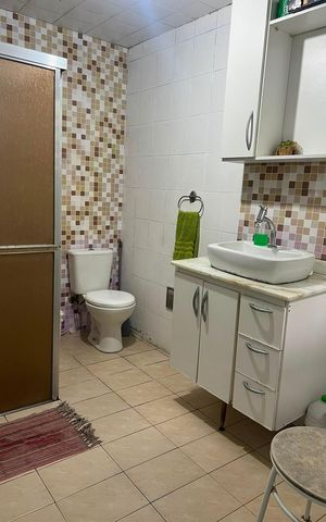 Casa à venda com 149m², 2 quartos e 1 vagaBanheiro
