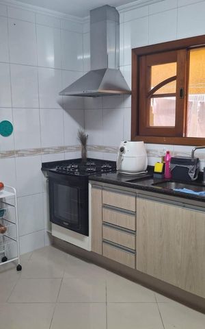 Casa à venda com 141m², 3 quartos e 2 vagas Casa à venda com 141m², 3 quartos e 2 vagasCozinha