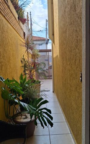 Casa à venda com 141m², 3 quartos e 2 vagas Casa à venda com 141m², 3 quartos e 2 vagasÁrea externa