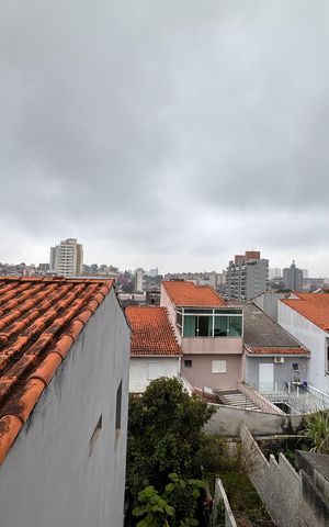 Casa à venda com 92m², 2 quartos e 1 vaga Casa à venda com 92m², 2 quartos e 1 vagaVista da Sacada da Quarto 2