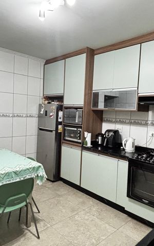 Casa à venda com 180m², 4 quartos e 2 vagas Casa à venda com 180m², 4 quartos e 2 vagasCozinha