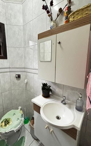 Casa à venda com 180m², 4 quartos e 2 vagas Casa à venda com 180m², 4 quartos e 2 vagasBanheiro