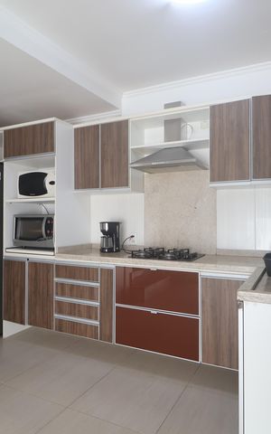 Casa à venda com 77m², 2 quartos e 2 vagasSala/Cozinha