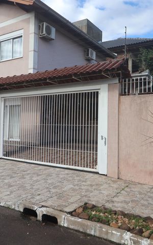 Casa à venda com 77m², 2 quartos e 2 vagasFachada