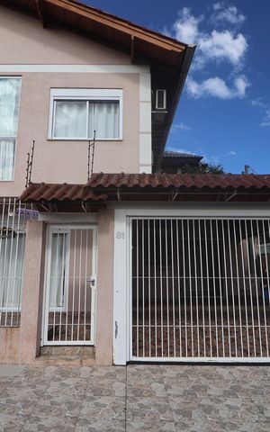 Casa à venda com 77m², 2 quartos e 2 vagasFachada
