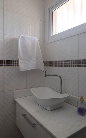 Casa à venda com 77m², 2 quartos e 2 vagasLavabo