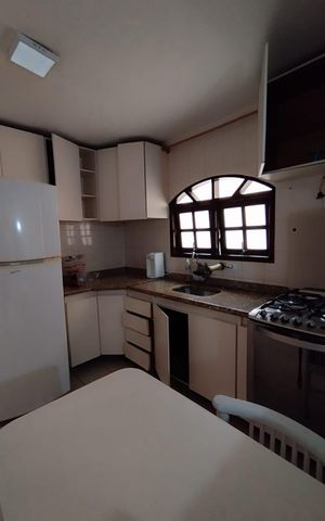 Casa à venda com 125m², 2 quartos e 2 vagas Casa à venda com 125m², 2 quartos e 2 vagasCozinha