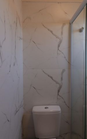 Casa à venda com 105m², 3 quartos e 2 vagasBanheiro da Suíte