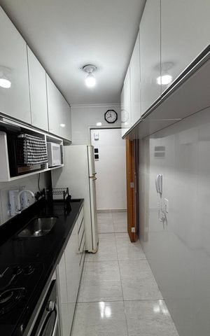 Apartamento à venda com 48m², 2 quartos e 1 vaga Apartamento à venda com 48m², 2 quartos e 1 vagaCozinha