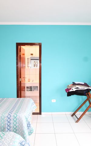 Casa à venda com 180m², 2 quartos e 2 vagasQuarto Suíte 1