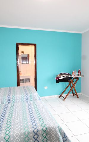 Casa à venda com 180m², 2 quartos e 2 vagasQuarto Suíte 1