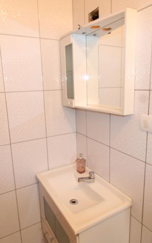 Casa à venda com 180m², 2 quartos e 2 vagasBanheiro da Suíte 1