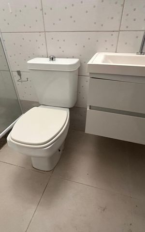 Casa de condomínio para alugar com 200m², 4 quartos e 3 vagasBanheiro Social