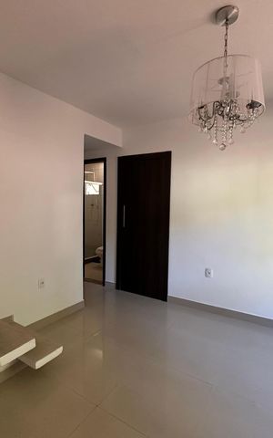 Casa de condomínio para alugar com 200m², 4 quartos e 3 vagasSala