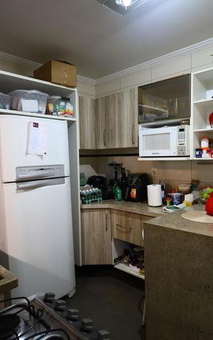 Casa de condomínio à venda com 112m², 2 quartos e 1 vagaCozinha e Área de Serviço