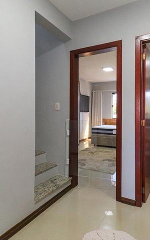 Casa à venda com 133m², 3 quartos e 2 vagas Casa à venda com 133m², 3 quartos e 2 vagasCorredor