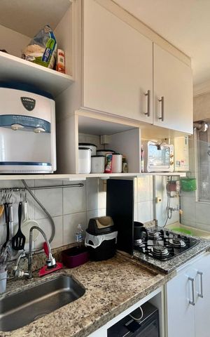 Apartamento à venda com 54m², 2 quartos e 1 vaga Apartamento à venda com 54m², 2 quartos e 1 vagaCozinha e Área de Serviço