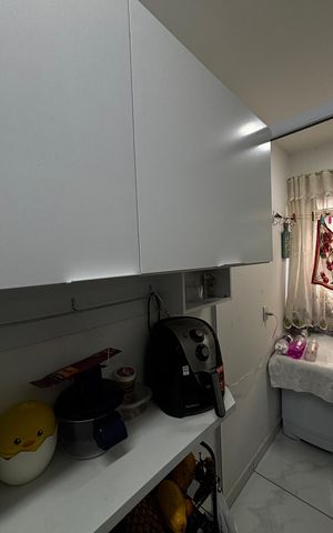 Apartamento à venda com 54m², 2 quartos e 1 vaga Apartamento à venda com 54m², 2 quartos e 1 vagaCozinha e Área de Serviço