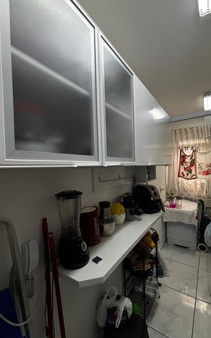 Apartamento à venda com 54m², 2 quartos e 1 vaga Apartamento à venda com 54m², 2 quartos e 1 vagaCozinha e Área de Serviço