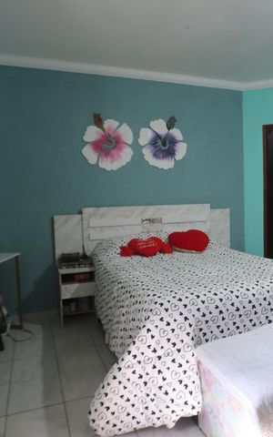 Casa à venda com 63m², 2 quartos e 2 vagasSala e Quarto