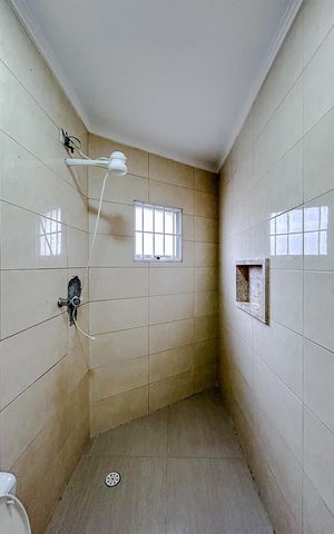 Casa à venda com 120m², 3 quartos e sem vagaBanheiro da Suíte 1