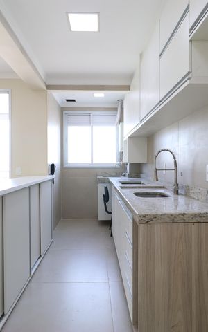 Apartamento à venda com 58m², 2 quartos e 2 vagasCozinha e Área de serviço 